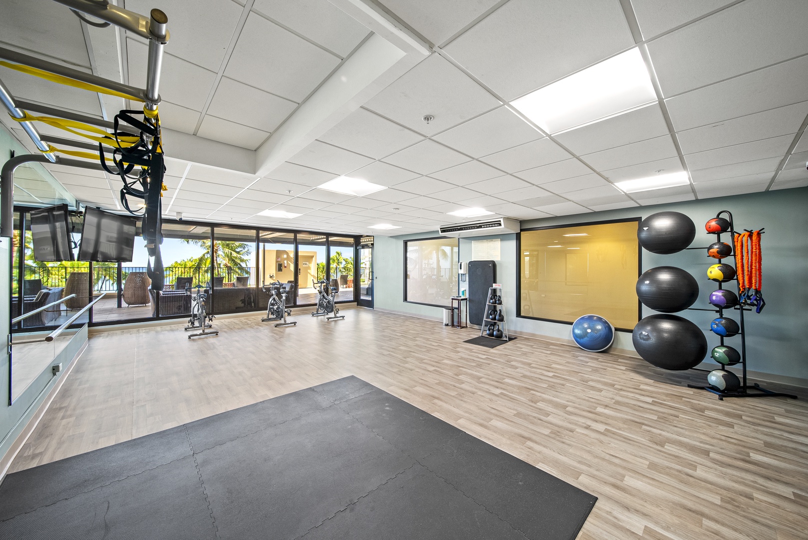 Honolulu Vacation Rentals, Aston Waikiki Beach Tower 602 - Stay active in the fully equipped fitness center with natural light and island views.