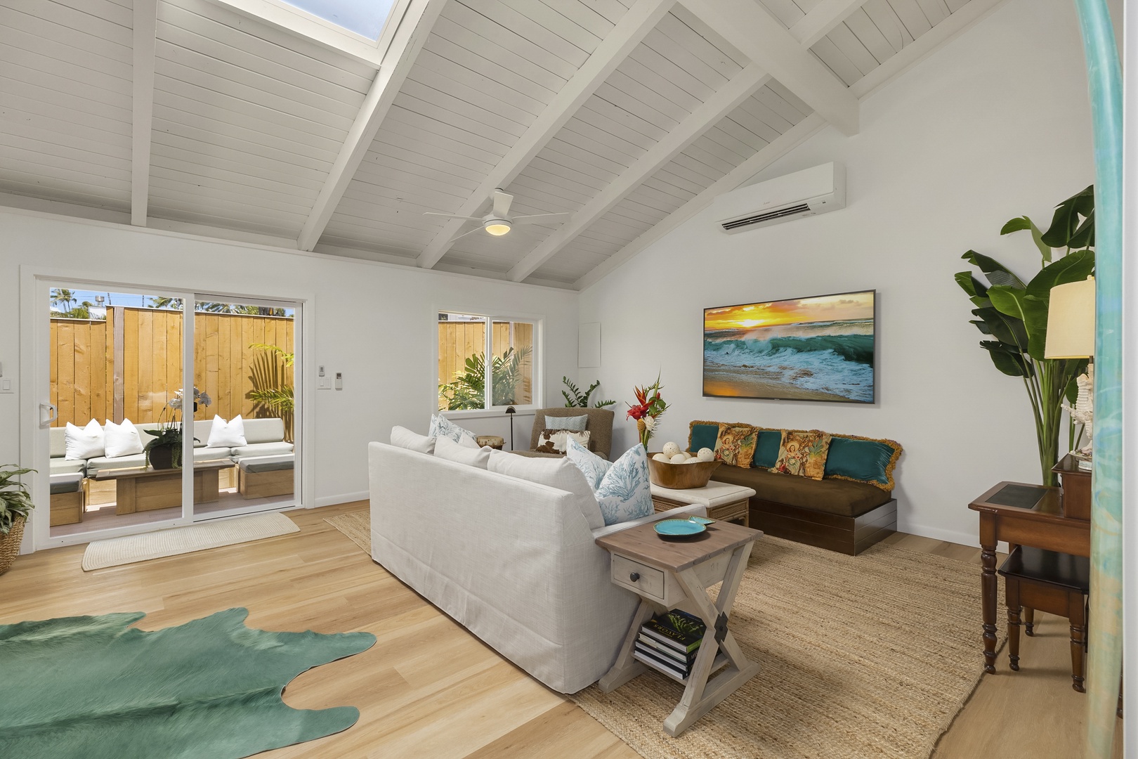 Kailua Vacation Rentals, Ranch Beach House - Living Room opens up to private outdoor lanai.