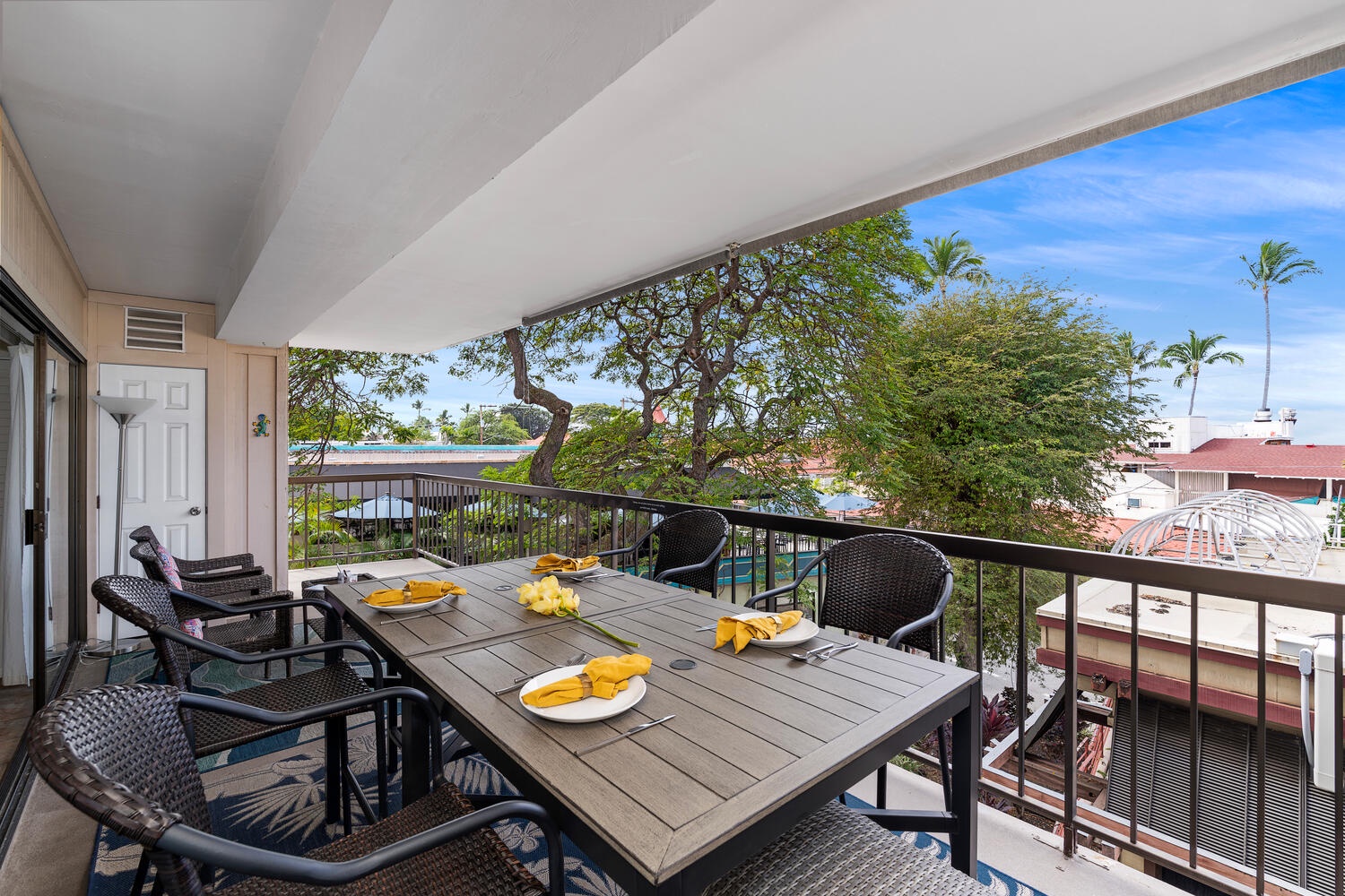 Kailua Kona Vacation Rentals, Kona Plaza 201 - Tropical breezes carry island scents through swaying palms. Your outdoor dining table awaits morning coffee and sunset meals.