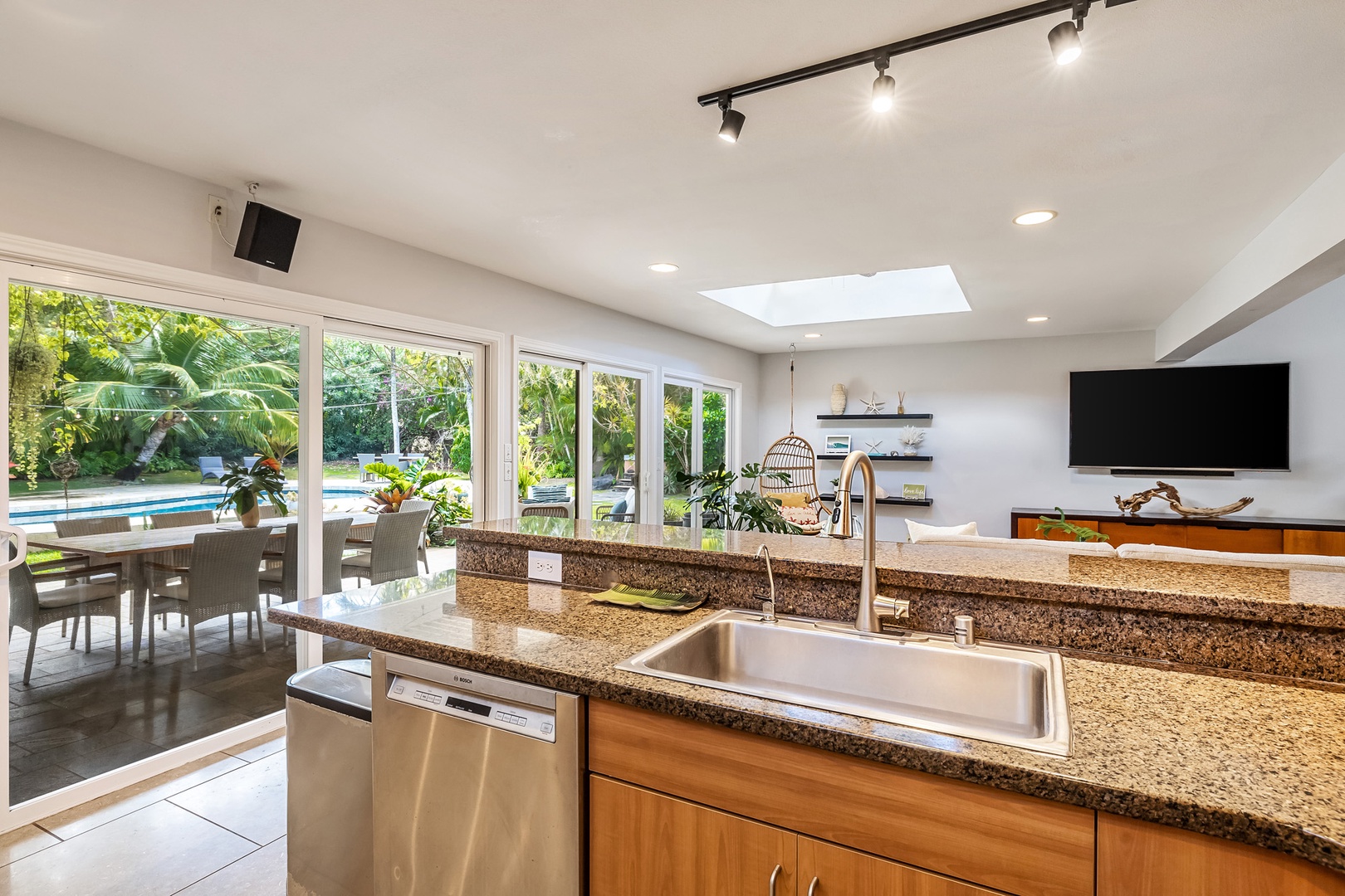 Honolulu Vacation Rentals, Hale Ho'omaha - The kitchen sink overlooks the living area and lanai