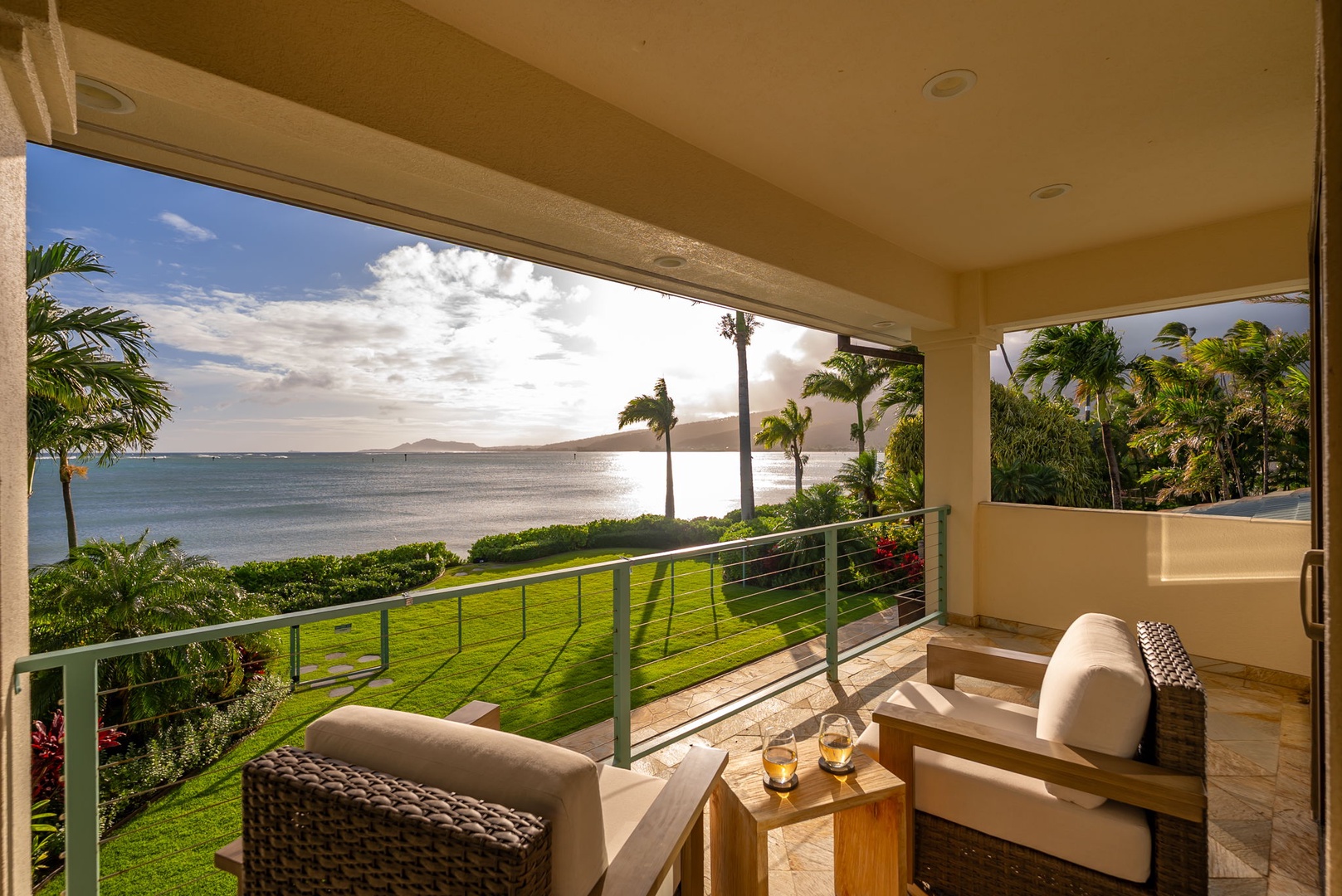 Honolulu Vacation Rentals, Maunalua Estate - Start your morning with coffee and panoramic water views framed by swaying palms.