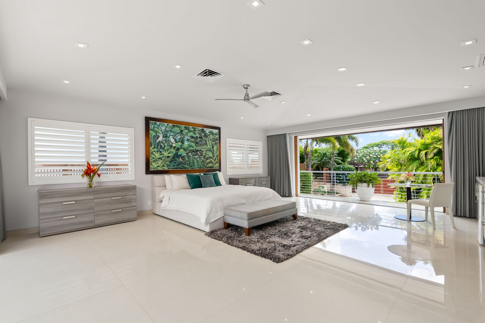 Honolulu Vacation Rentals, Diamond Head Beachfront Estate - Your spacious master suite opens to lush tropical gardens, blending modern elegance with calming natural light and serene outdoor views—your private sanctuary awaits.