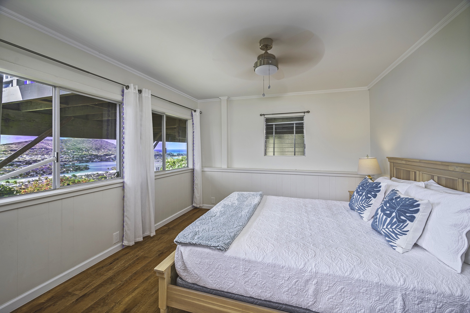Honolulu Vacation Rentals, Hale Malia - The guest suite has a queen bed, direct access to the deck, and an ensuite bath
