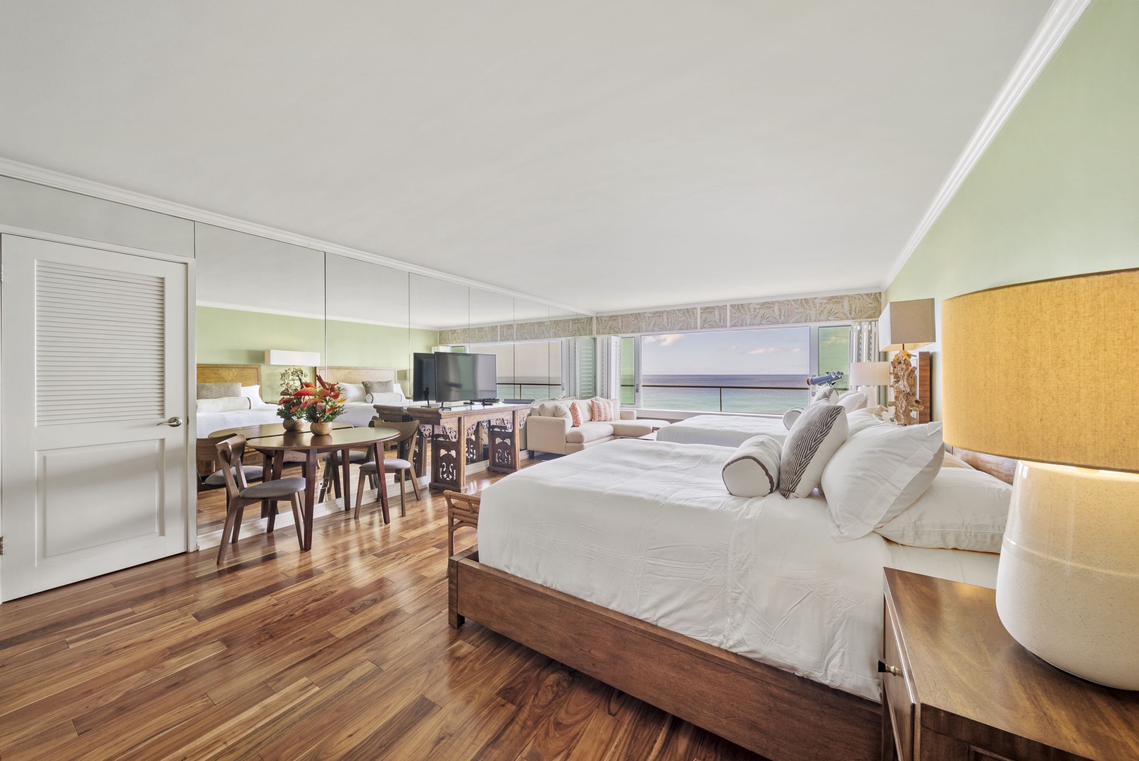 Honolulu Vacation Rentals, Kaimana Breeze - Spacious suite with stylish furnishings, hardwood floors, and open layout—perfect for unwinding after a day on the beach.