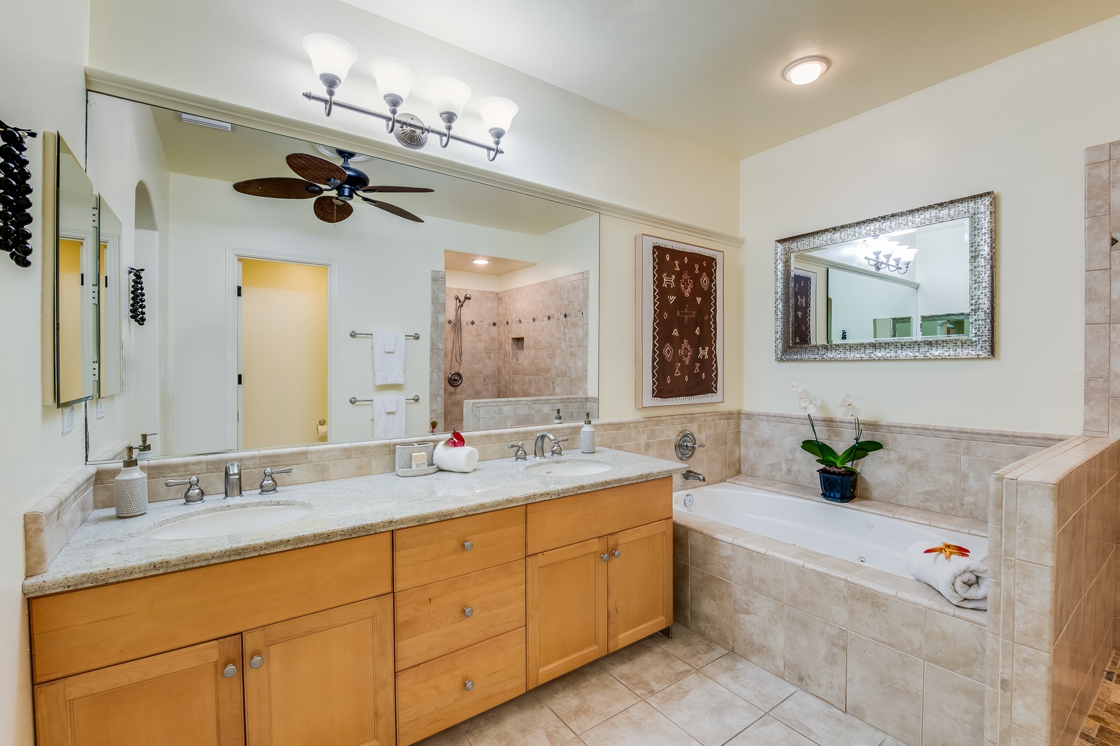 Kamuela Vacation Rentals, Mauna Lani Fairways #204 - Primary Ensuite Bath w/ Dual Sinks & Granite Counters