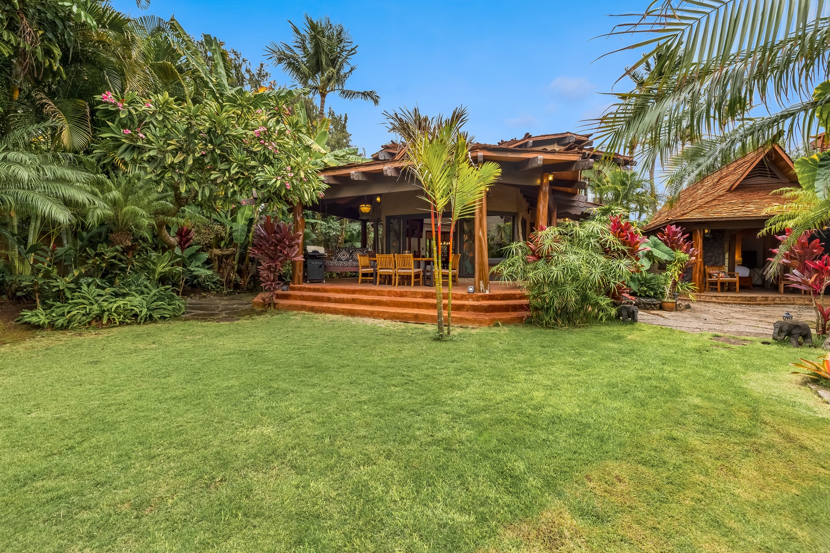 Waimanalo Vacation Rentals, Hawaii Hobbit House - Lush tropical landscaping.