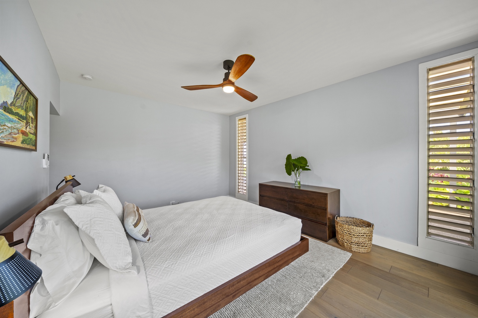 Haleiwa Vacation Rentals, Hale Mahina - Recharge in a peaceful bedroom designed with soft tones and natural light.