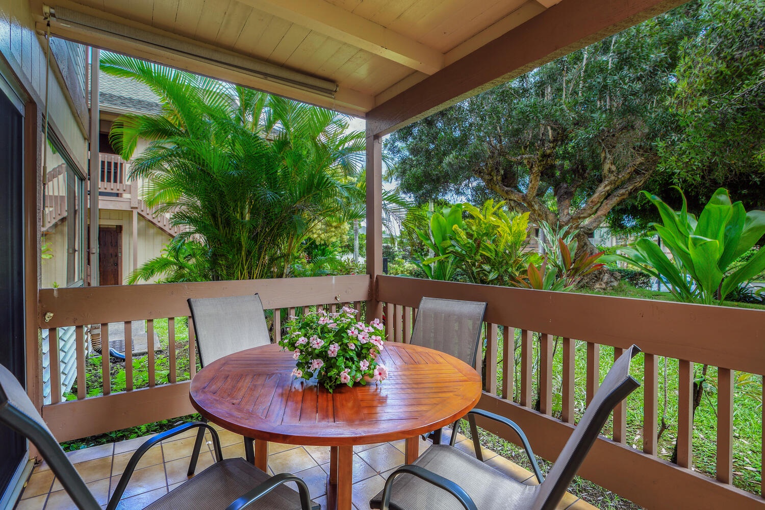 Princeville Vacation Rentals, Hideaway Haven - Savor al fresco meals or have a good morning conversation at the lanai, a serene outdoor oasis.