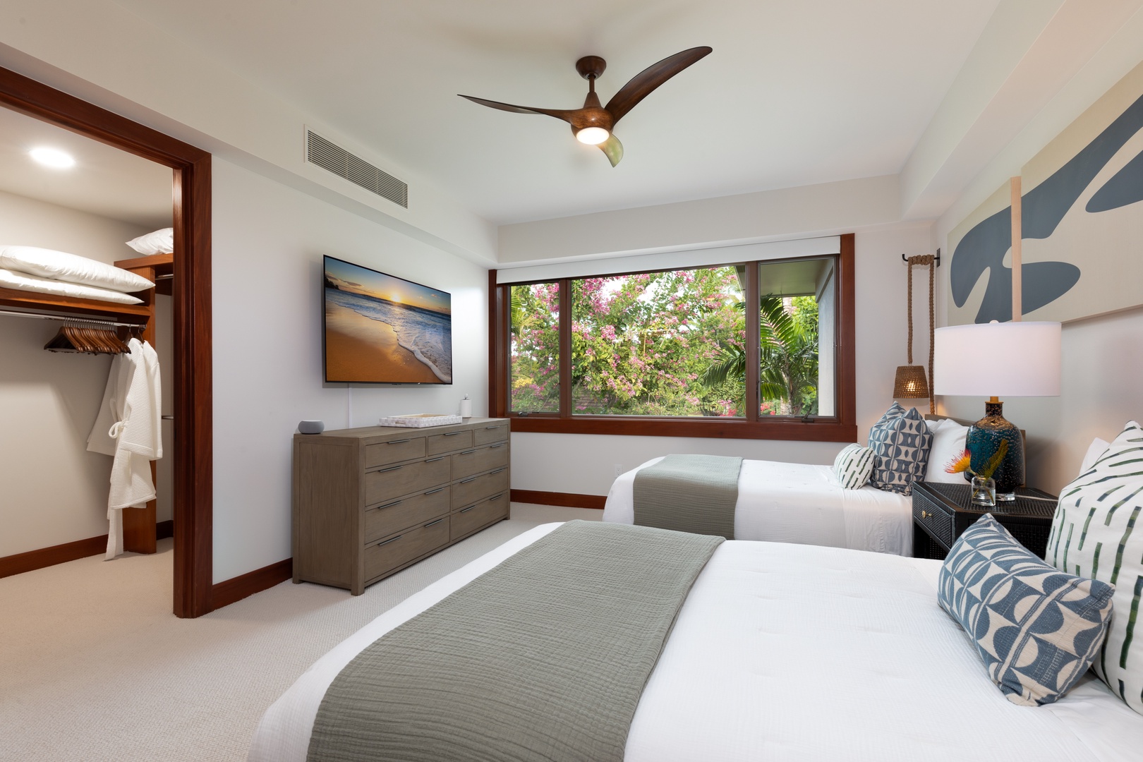 Kailua Kona Vacation Rentals, 3BD Waiulu Villa 111D at Hualalai Resort - Guest bedroom with two full-sized beds and lush garden views.