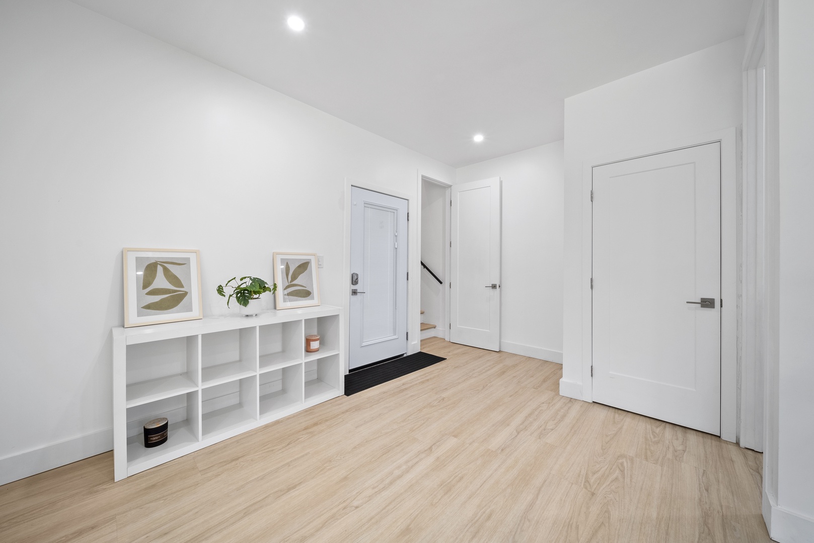 Haleiwa Vacation Rentals, Sunset Beach Island Retreat - Downstairs bedroom entryway, designed with sleek storage and a welcoming ambiance