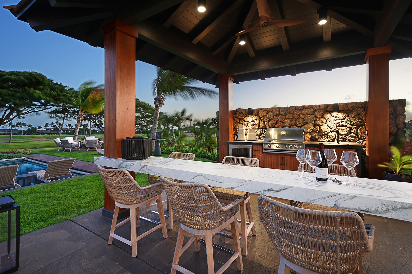 Koloa Vacation Rentals, Hale Pakika at Kukui'ula - Grab a seat the tropical poolside bar and grill setup for your end of day recap.