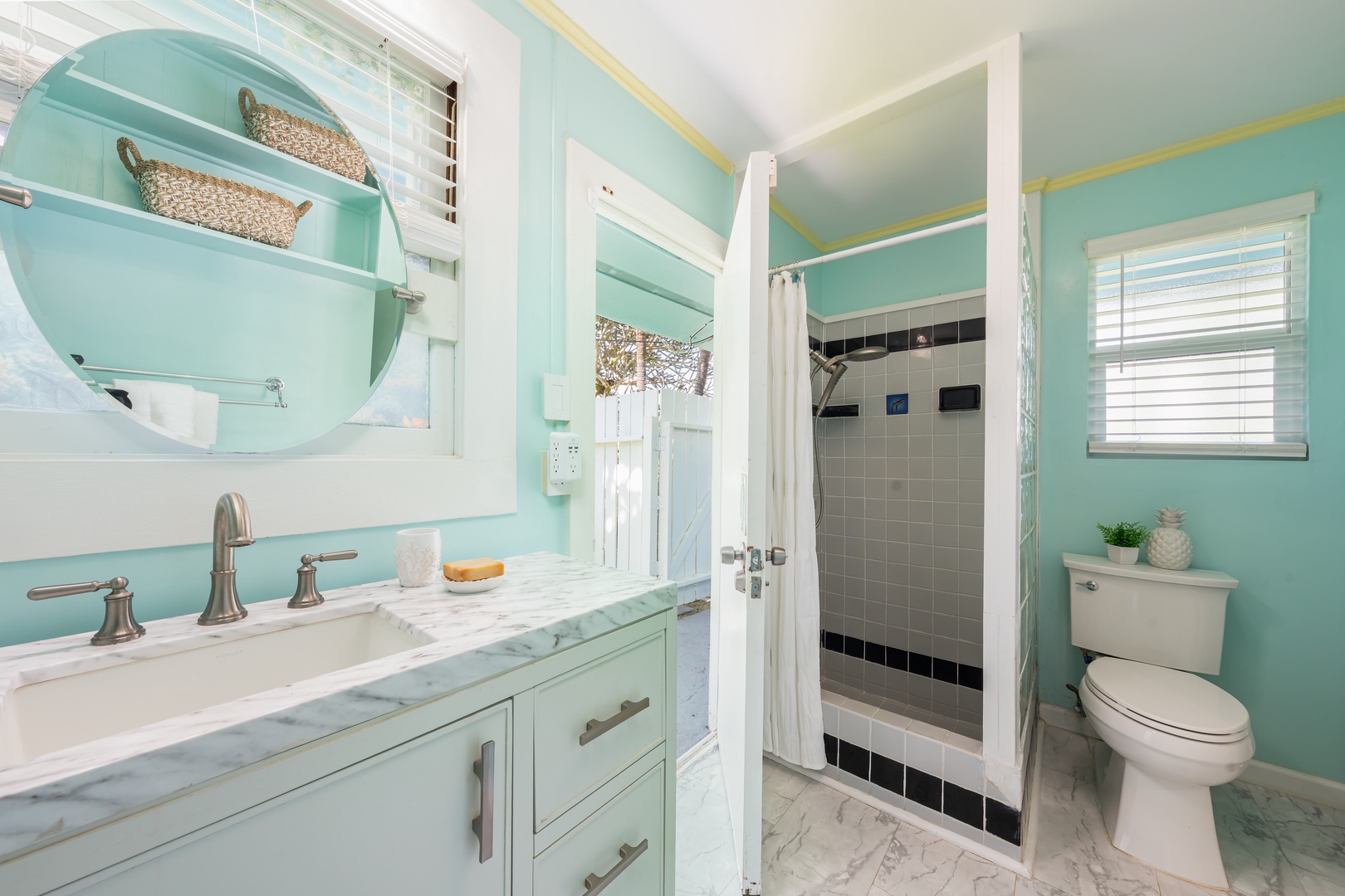 Hauula Vacation Rentals, Private Beach Paradise - Sea-blue walls and a walk-in shower keep the bath calm and simple.