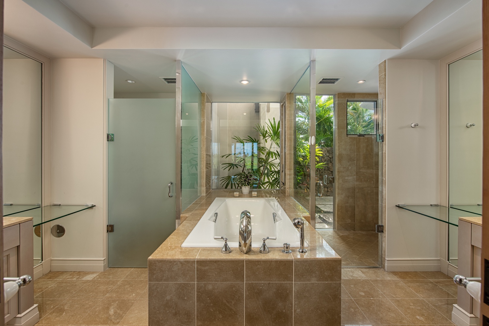 Kailua Kona Vacation Rentals, 3BD Palm Villa (130B) at Hualalai Resort - Relaxing primary bath with dual sinks and dual vanity spaces