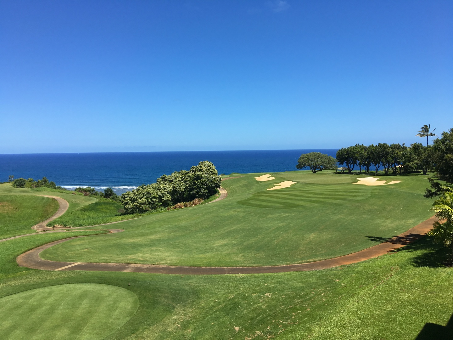 Princeville Vacation Rentals, Hanalei Bay Resort 4301 - Enjoy a round of golf at the stunning Princeville Golf Course with panoramic mountain views.