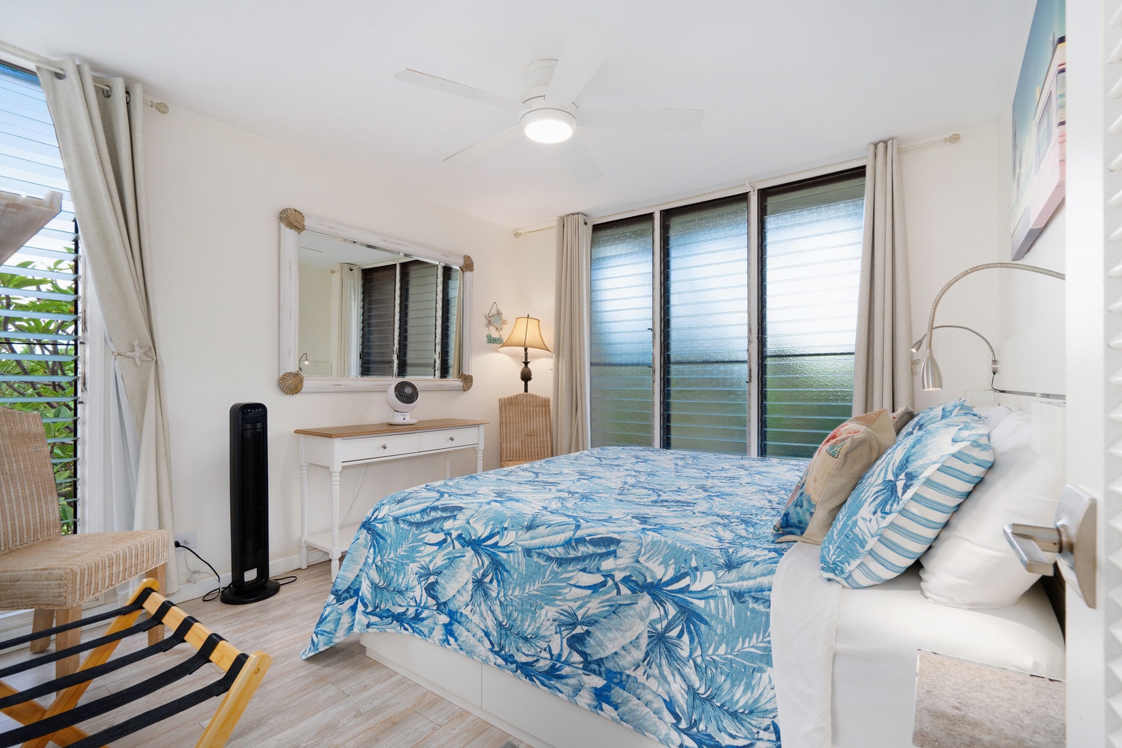 Kihei Vacation Rentals, Punahoa Beach 205 - Soft window light and a ceiling fan turn this bedroom into an easy afternoon nap spot.