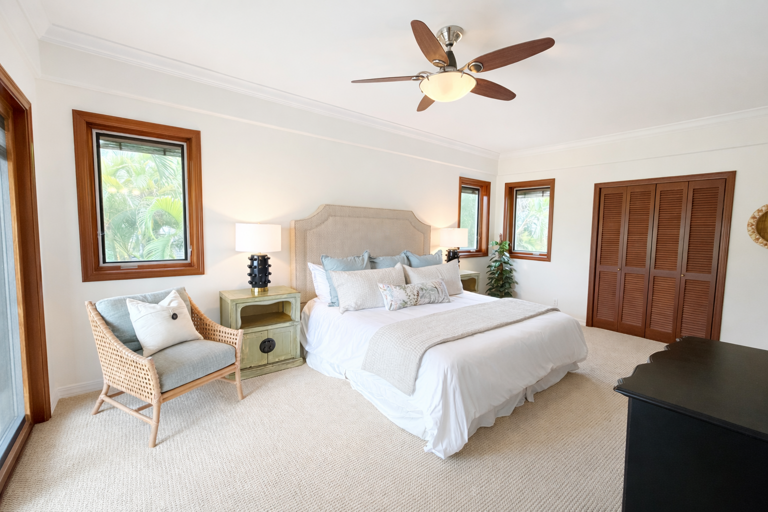 Honolulu Vacation Rentals, Maunalua Estate - Drift off in your serene bedroom sanctuary, where crisp linens meet tropical breezes from your ceiling fan and garden views.