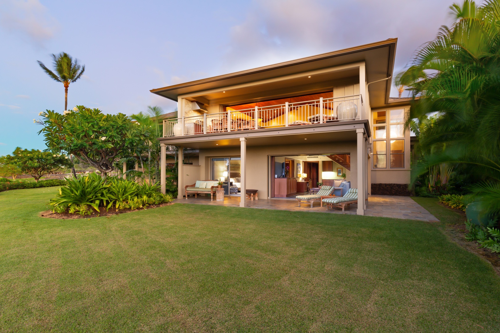 Kailua Kona Vacation Rentals, 3BD Ke Alaula Villa (210A) at Four Seasons Resort at Hualalai - View of the back of the home and yard at sunset.
