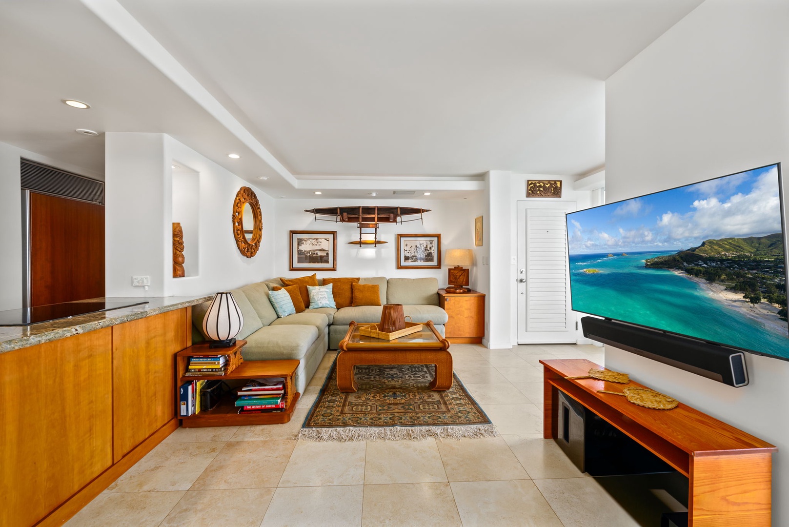 Honolulu Vacation Rentals, Kaimana Views - Comfortable living room with plush seating and coastal decor, offering an ideal space to unwind after a day in paradise.