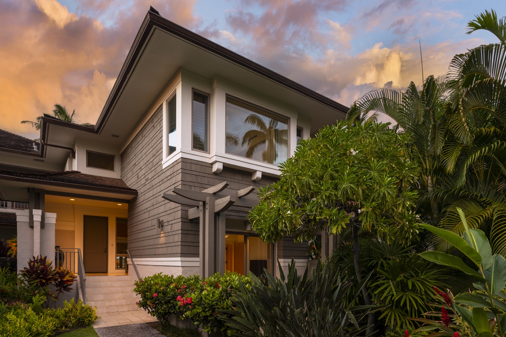 Kailua Kona Vacation Rentals, 3BD Palm Villa (130B) at Hualalai Resort - Approach the entrance of the villa to find alluring colors peaking over the leaves