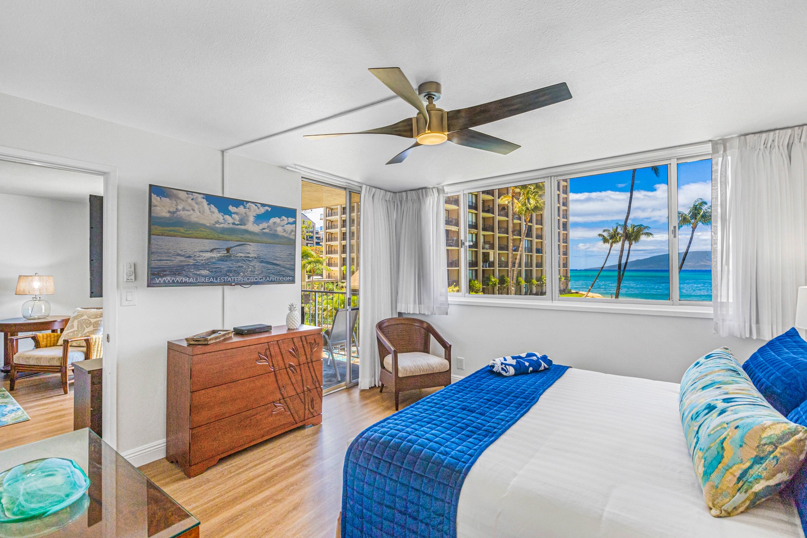 Lahaina Vacation Rentals, Royal Kahana 213 - Wake up to ocean views from the primary bedroom at Royal Kahana 213, complete with lanai access and a TV.