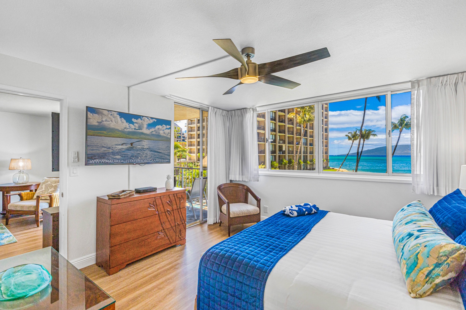 Lahaina Vacation Rentals, Royal Kahana 213 - Wake up to breathtaking ocean views from the comfort of the primary bedroom, complete with a TV for relaxation and easy access to the lanai.