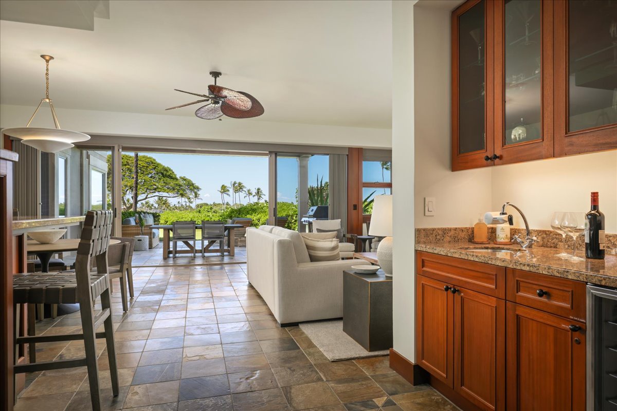Kailua Kona Vacation Rentals, 2BD Fairways Villa (120C) at Four Seasons Resort at Hualalai - Interior entryway with wet bar and wine fridge.