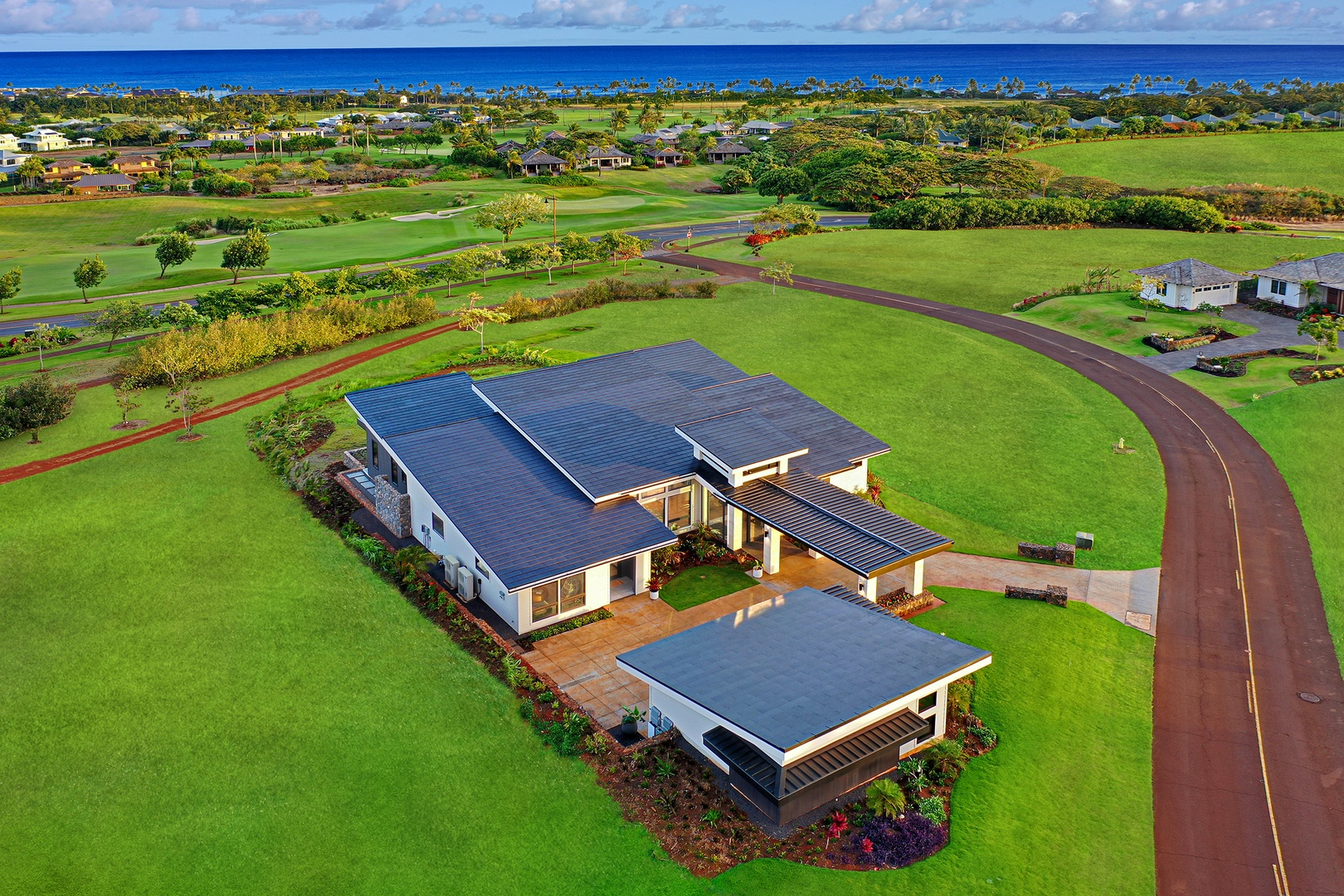 Koloa Vacation Rentals, Hale Mahina Hou - A bird's-eye view of the lush greenery surrounding this beautiful home