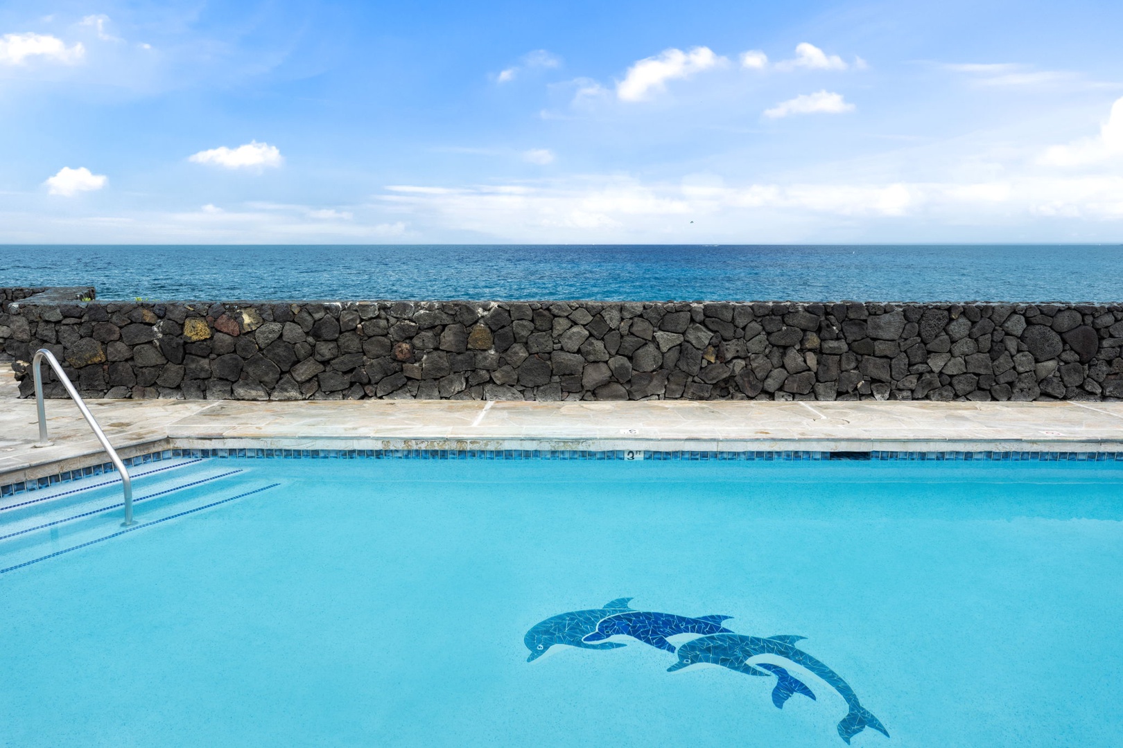 Kailua Kona Vacation Rentals, Sea Village 4213 - Dolphin mosaic pool with oceanfront views—your perfect Kona cooldown spot.