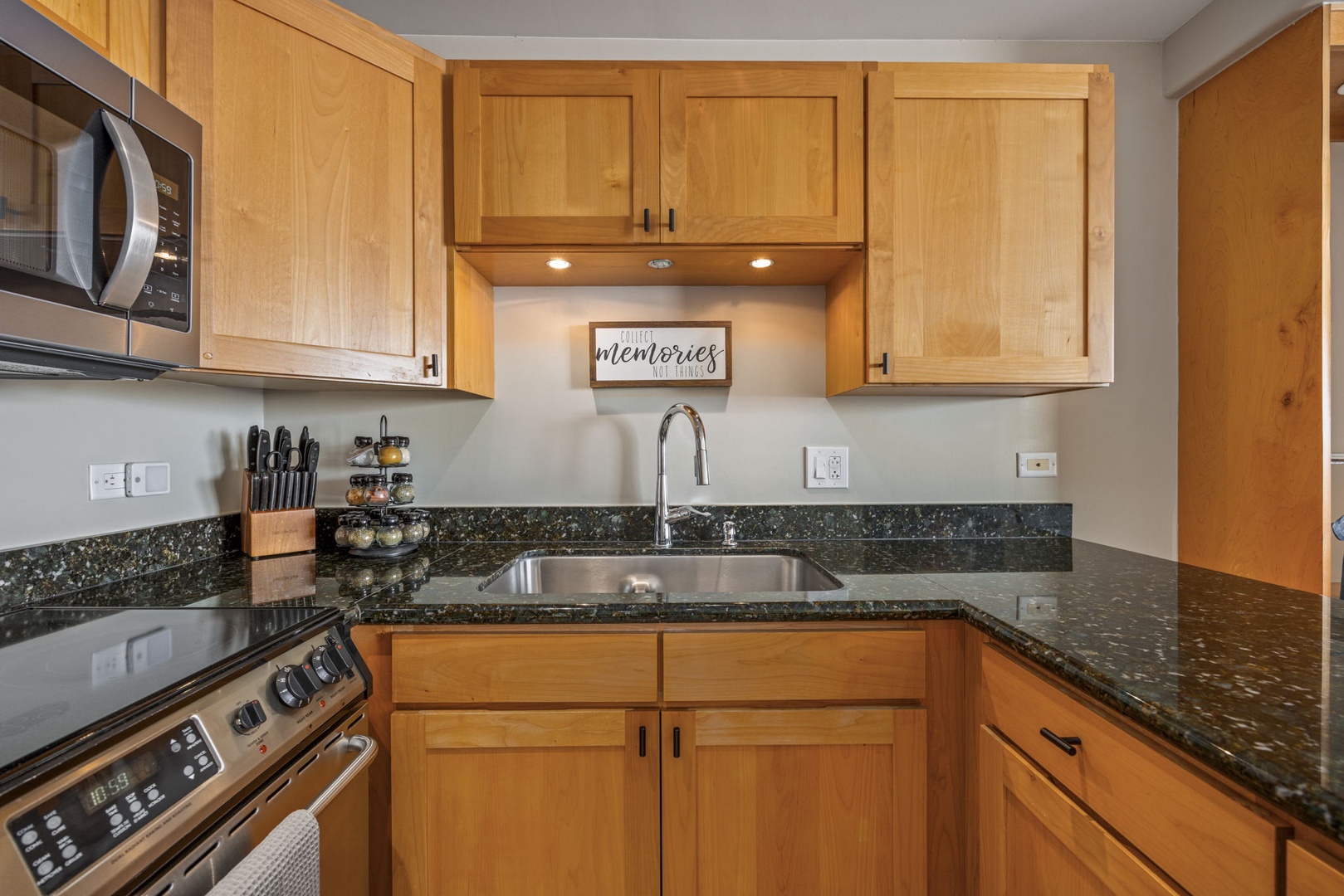 Wailuku Vacation Rentals, Milowai 310 - Reach for the spice rack or the knife block, this kitchen's prep corner has both stocked and ready.