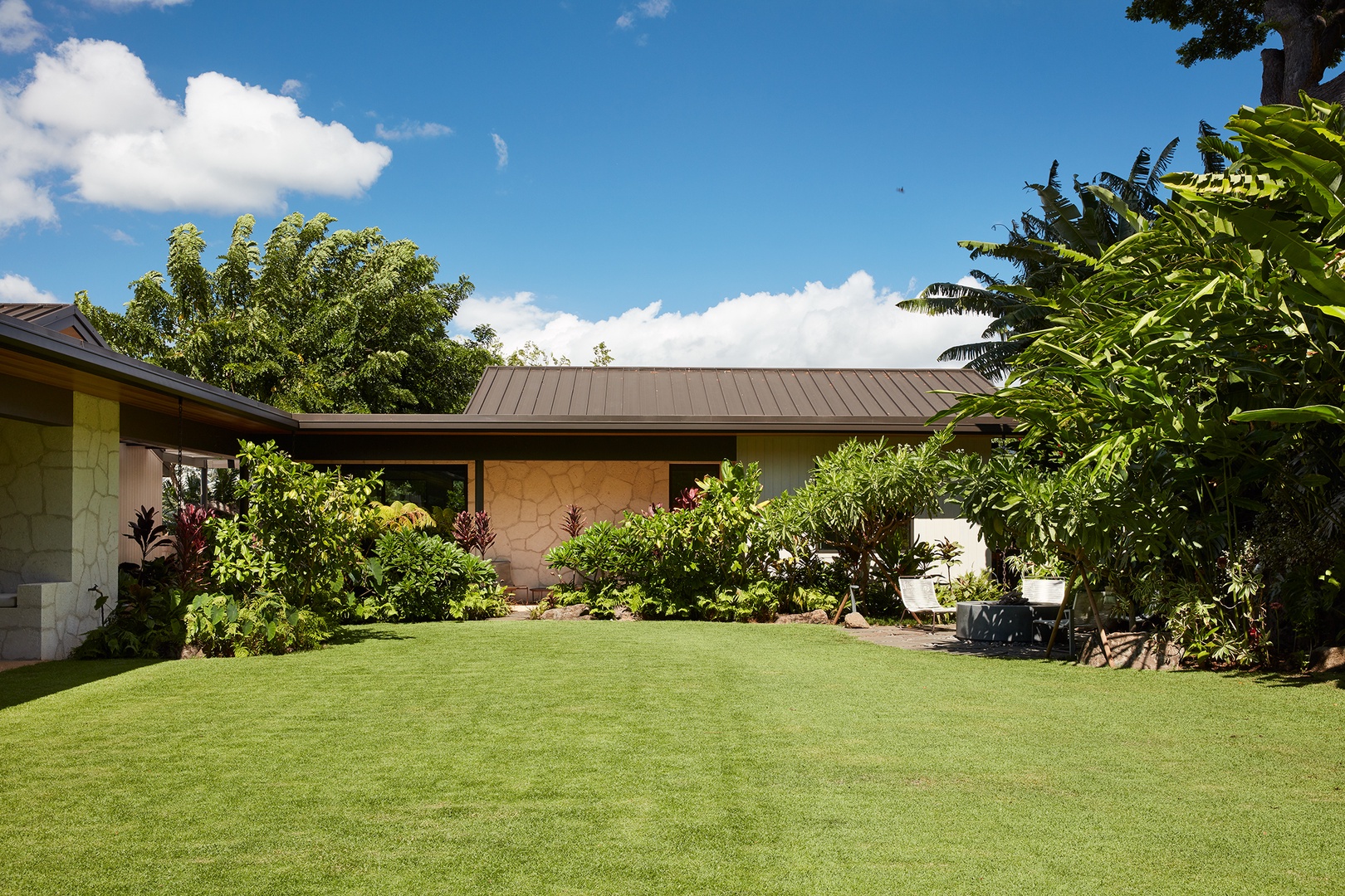 Honolulu Vacation Rentals, Diamond Head Hillside Estate** - From its lush gardens to its thoughtfully designed outdoor spaces, this private Honolulu estate offers an exceptional setting for extended island stays.