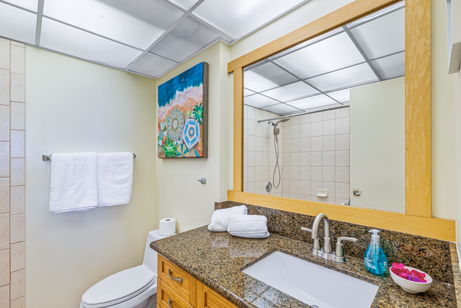 Lahaina Vacation Rentals, Kaanapali Shores 502 - This bright bathroom offers a sleek granite vanity and a walk-in shower, perfect for freshening up after a day in the sun.