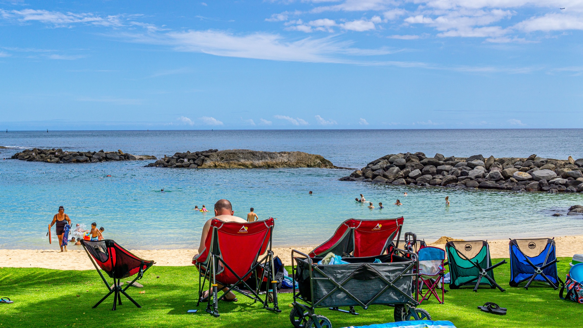 Kapolei Vacation Rentals, Ko Olina Beach Villas O401 - Happy days on the green grass at lagoon 2.