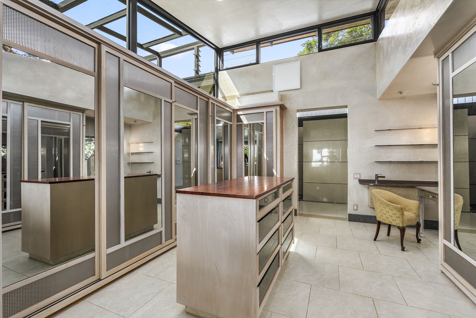 Honolulu Vacation Rentals, Tantalus Glass House (3 BD) - Step into your stunning glass-wrapped kitchen where natural light floods through skylights, creating a bright culinary workspace perfect for preparing memorable meals.