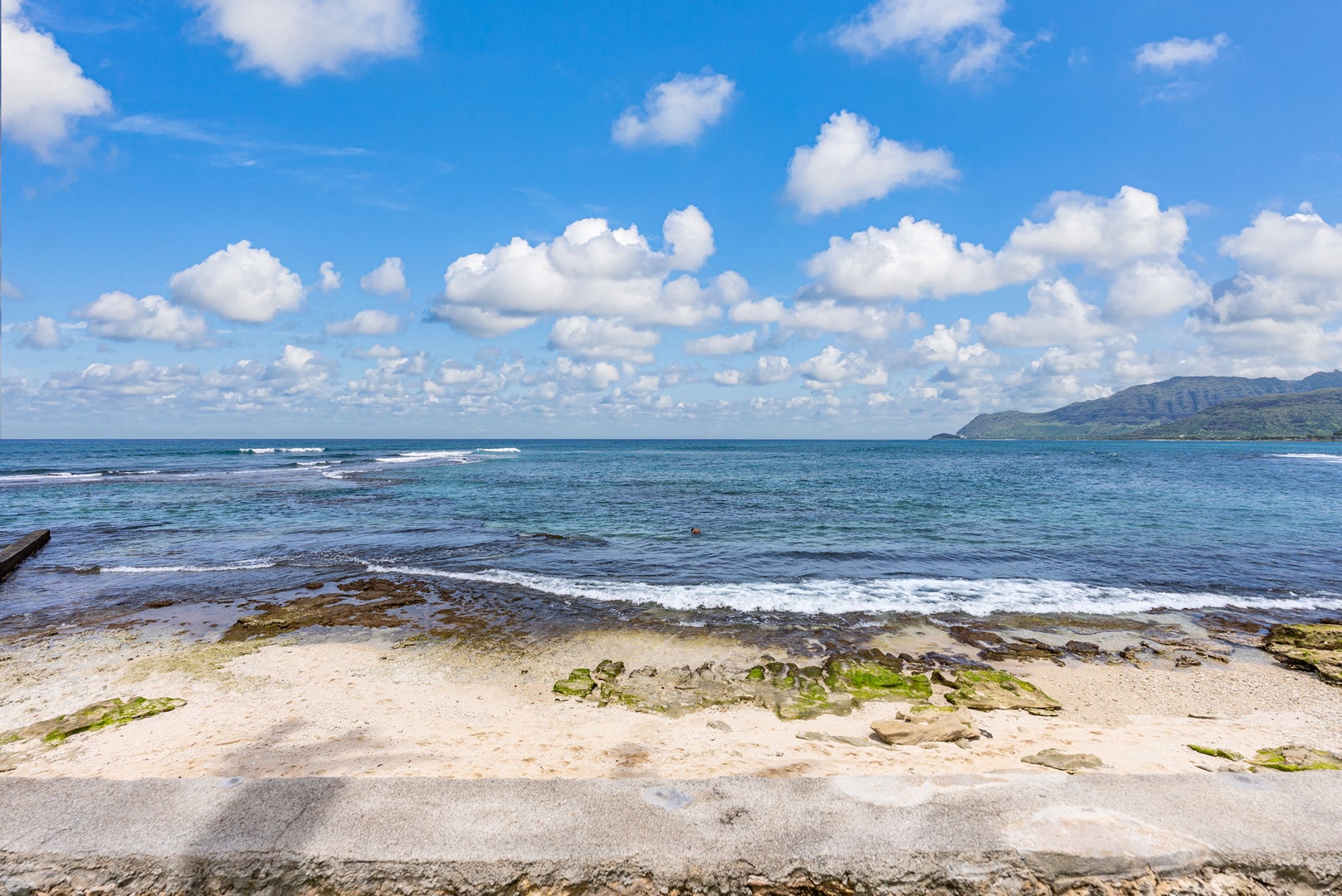 Waianae Vacation Rentals, Ma'ili Blue - Pristine coastline with crystal-clear waters and rolling mountains creating a stunning backdrop for the area's natural beauty.