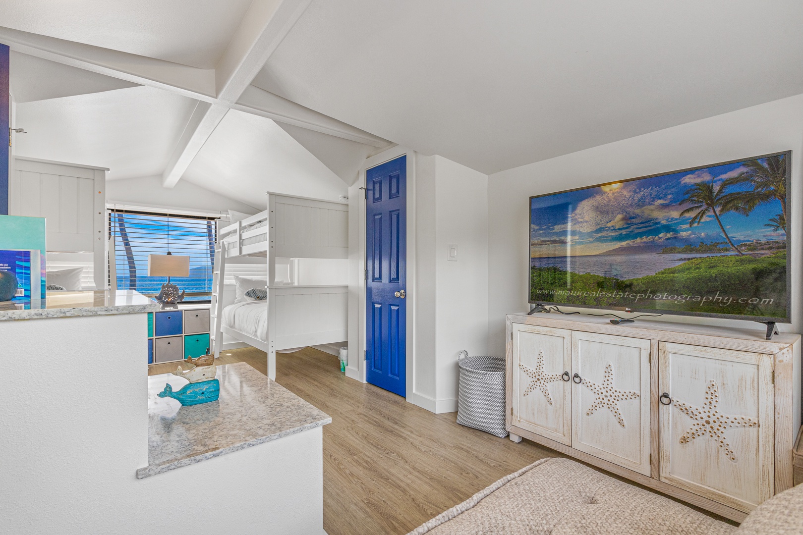 Lahaina Vacation Rentals, Puamana 254-2 - Seating for adults is available in Puamana 254-2’s kid-friendly den, perfect for joining the fun.