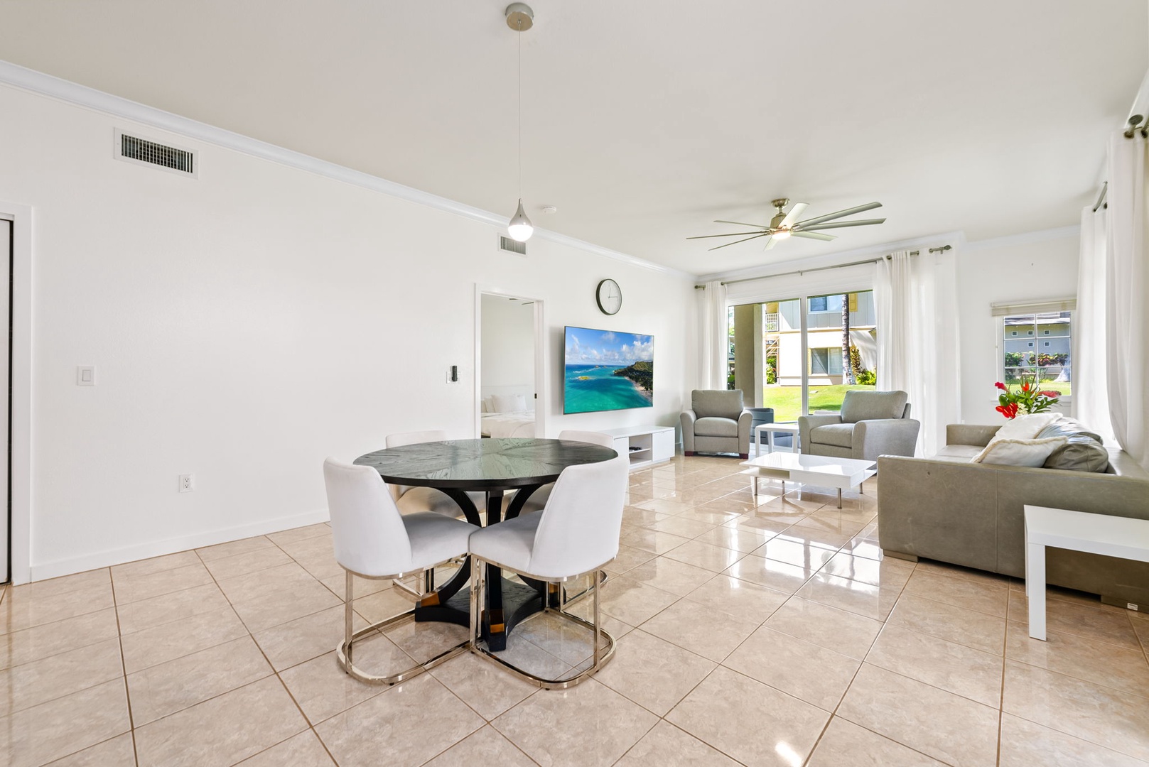 Kapolei Vacation Rentals, Kai Lani Luxury 6D - Open dining and living area with natural light and comfortable seating, perfect for gathering and relaxing.