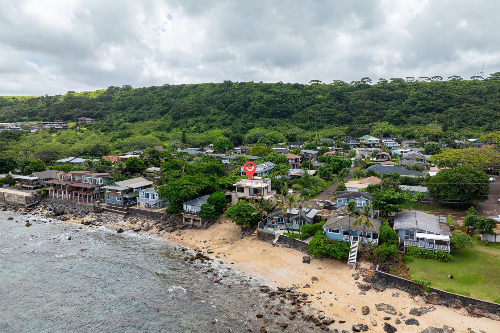 Haleiwa Vacation Rentals, HaleGator - Aerial view highlighting HaleGator's remarkable oceanfront location along a quiet stretch of Oahu’s legendary North Shore.