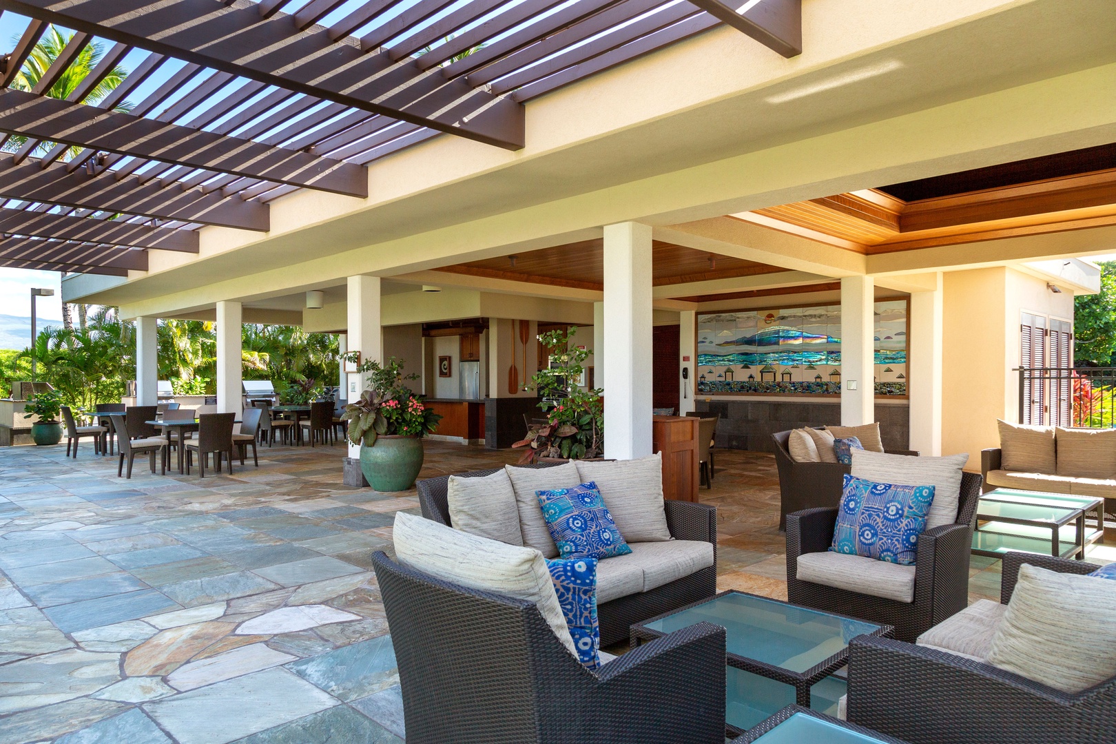 Kamuela Vacation Rentals, Mauna Lani Point E105 - The clubhouse offers covered lounges, BBQ grills, and a full outdoor kitchen for entertaining.