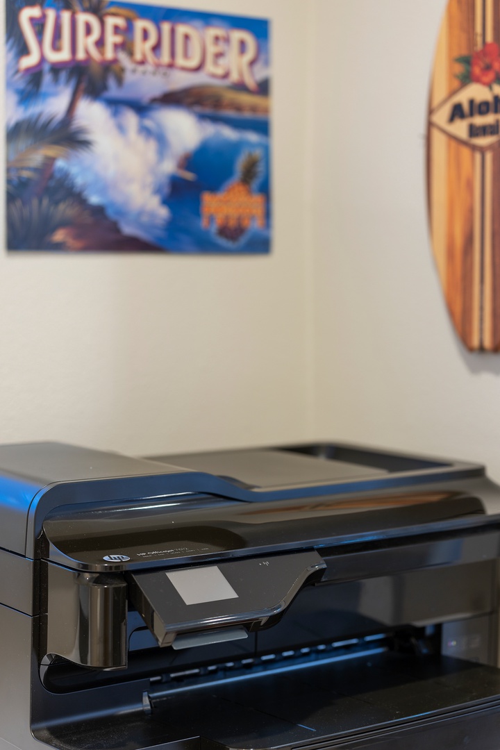 Stay connected with your home office setup, featuring a modern printer ready for all your work needs.