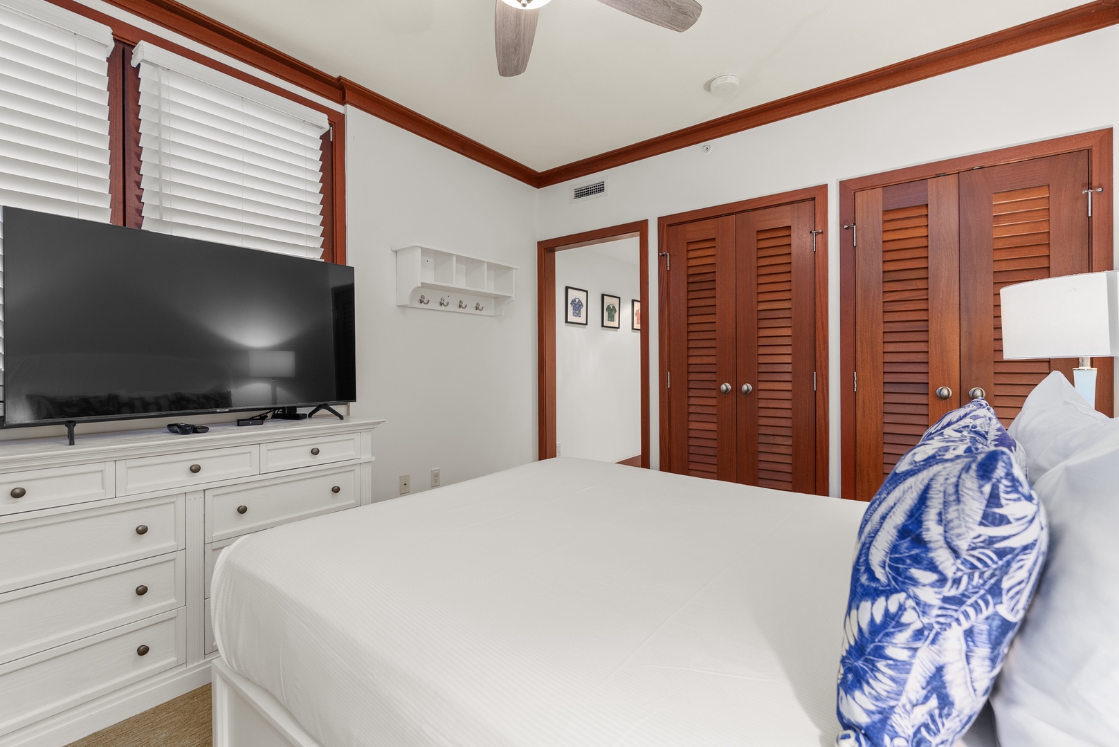 The queen bedroom complete with a Smart TV, creating a comfortable space to unwind at the end of the day.