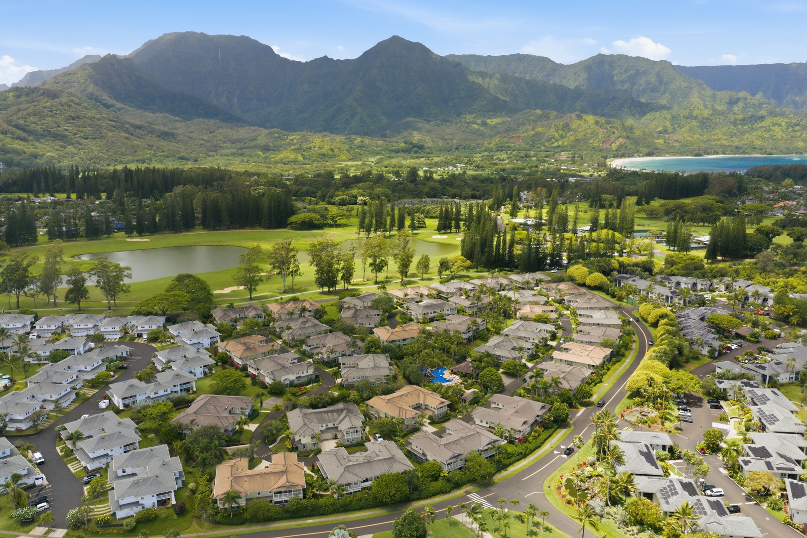 Princeville Vacation Rentals, Hale Kaua'i - A bird's-eye view reveals the peaceful residential neighborhood surrounded by tropical beauty.