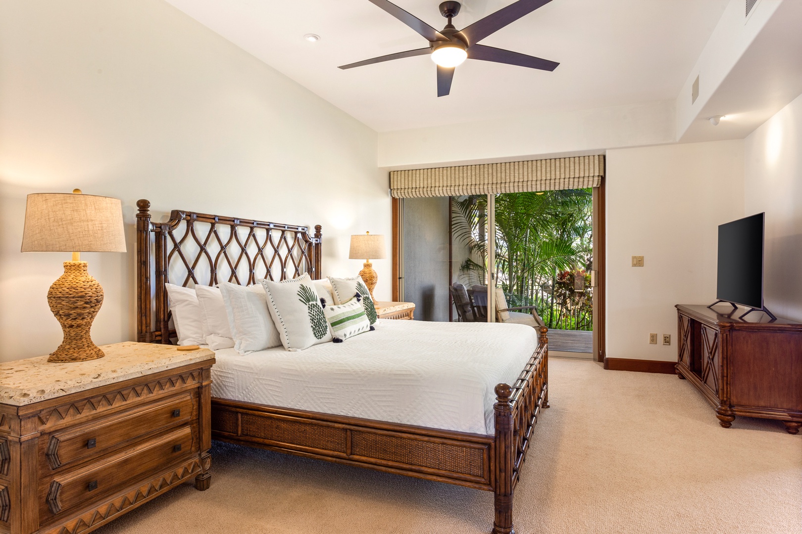 Kailua Kona Vacation Rentals, OFB 3BD Ka'Ulu Villa (129D) at Four Seasons Resort at Hualalai - Primary suite with king sized bed, lower lanai access, flatscreen television and ensuite bath.