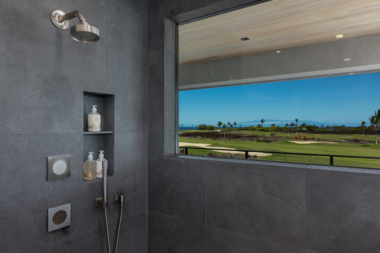 Waimea Vacation Rentals, 5BD Mauna Lani Lux Golf Estate (4) at One Ocean - This shower boasts a unique feature: an expansive window that frames the stunning view of the golf course, creating an exceptional experience where nature meets luxury.