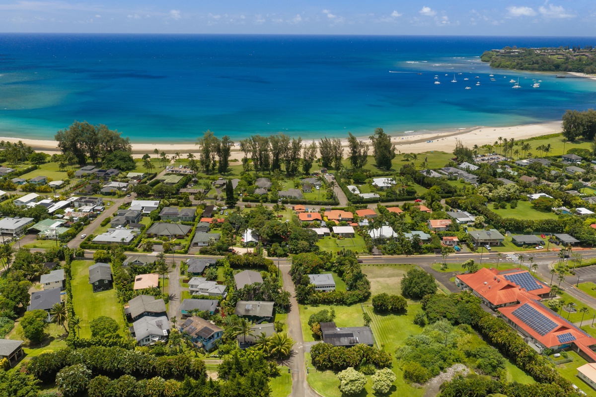 Hanalei Vacation Rentals, Hale Kanani (Kaua'i) TVNC 1342 - The turquoise water of Hanalei Bay curves just beyond the rooftops.