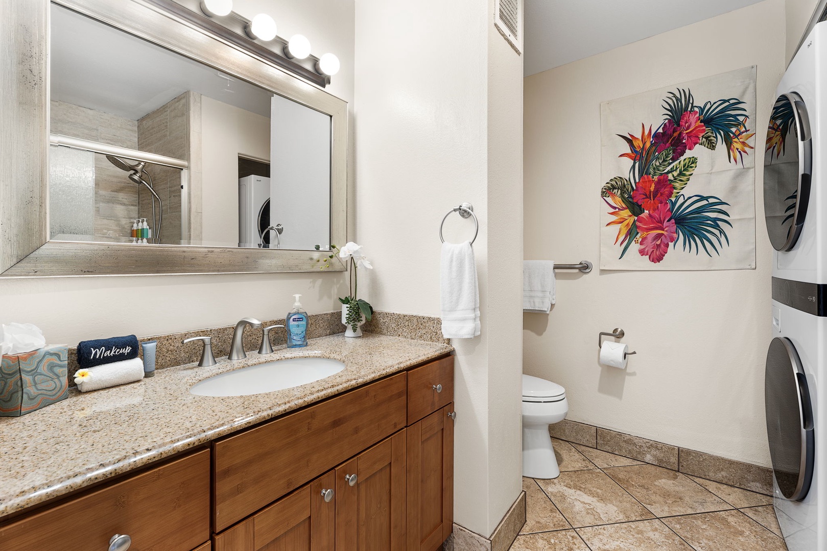Kailua Kona Vacation Rentals, Keauhou Kona Surf & Racquet 1104 - Get ready at the vanity with the washer and dryer right in the room.