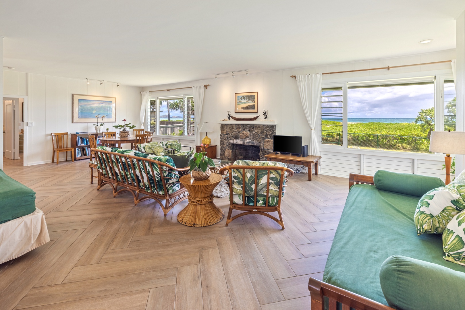 Kailua Vacation Rentals, Hale Moana Lanikai - Enjoy a spacious and inviting living area perfect for socializing and relaxing, with stylish seating and a scenic view.