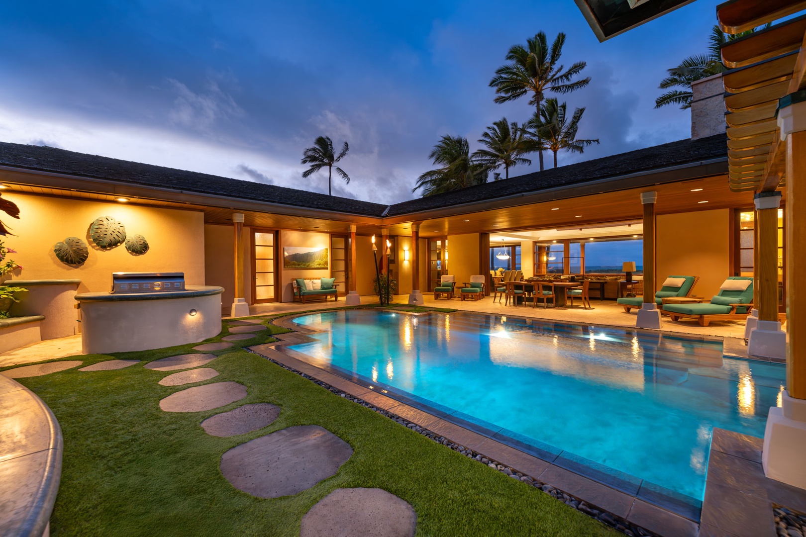 Kailua Vacation Rentals, Kailua Sands - Night-lit pool with stepping stone path and garden.