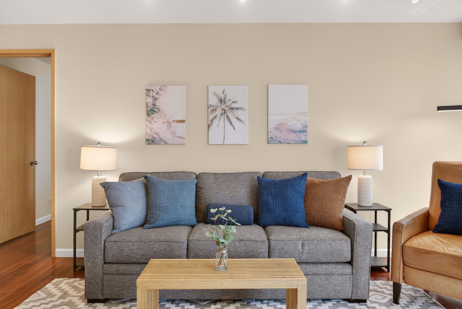 Honolulu Vacation Rentals, Island View at Waikiki Landmark - Relax into the cozy sofa beneath soft lighting and calming island-inspired décor.