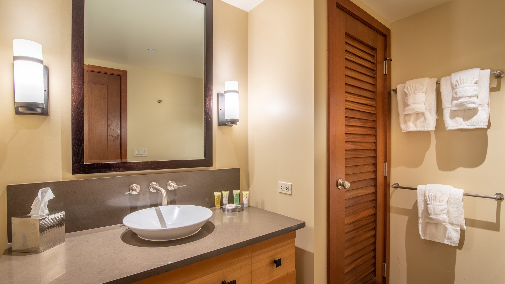 Kapolei Vacation Rentals, Ko Olina Beach Villas B608 - The second guest bathroom showcases warm wood accents, bringing a touch of island luxury to your stay.