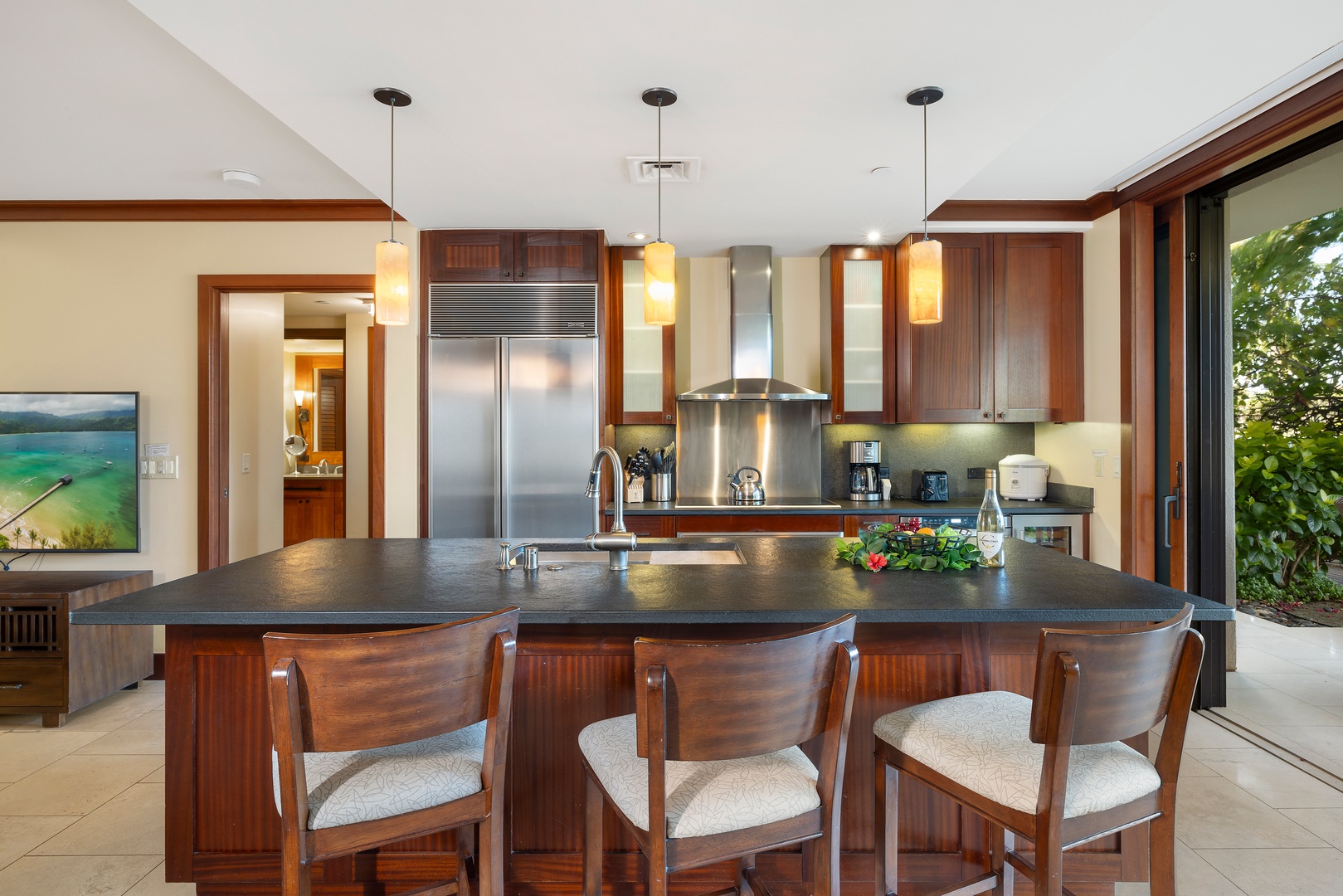 Kapolei Vacation Rentals, Ko Olina Beach Villas B107 - Kitchen island/bar for quick meals or cheers.